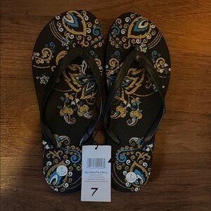 Revolution Black and Gold Flip Flops with Blue Details